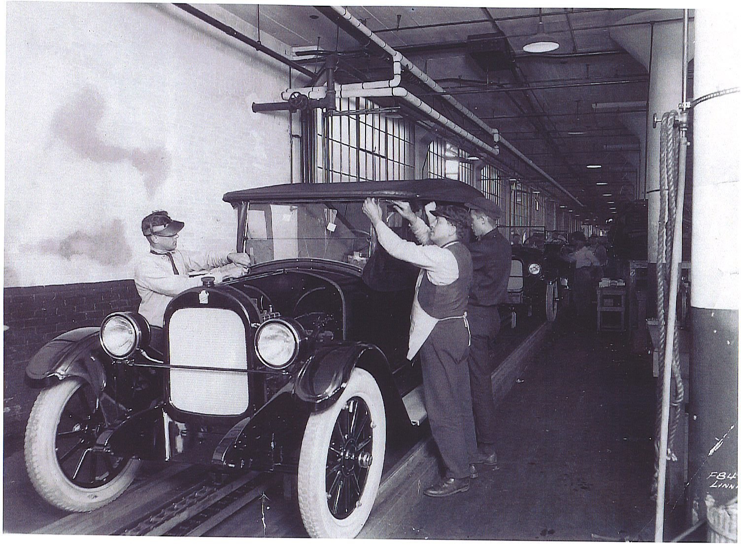 Workers on the Durant Motors assembly line